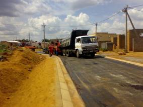 Typical view of road after receiving primer, ready for surfacing in Mohlakeng Township, West Rand