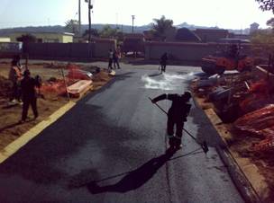 Surfacing of Filadelfia access road in Block L, Soshanguve